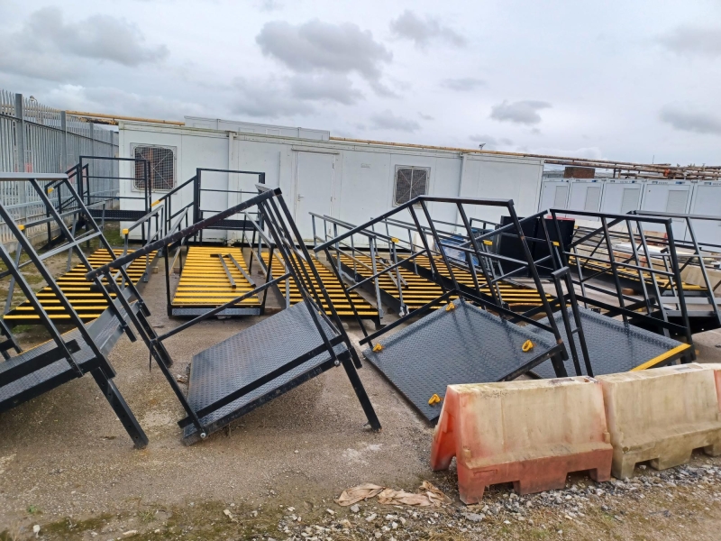 Steel handrails in workshop yard