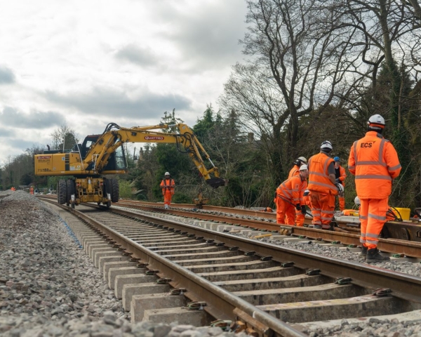 People in orange high vis working on the railway